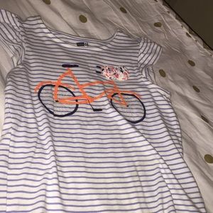 An Old Navy shirt that has a bicycle on it